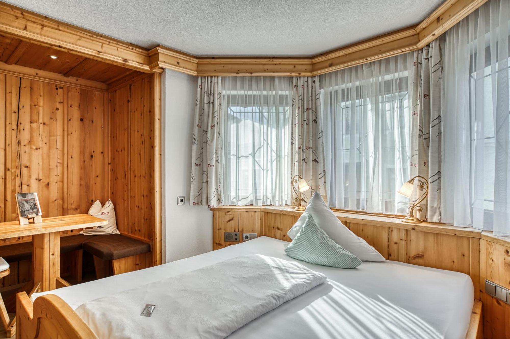 Hotel Alpenstolz Mieders Quarto foto